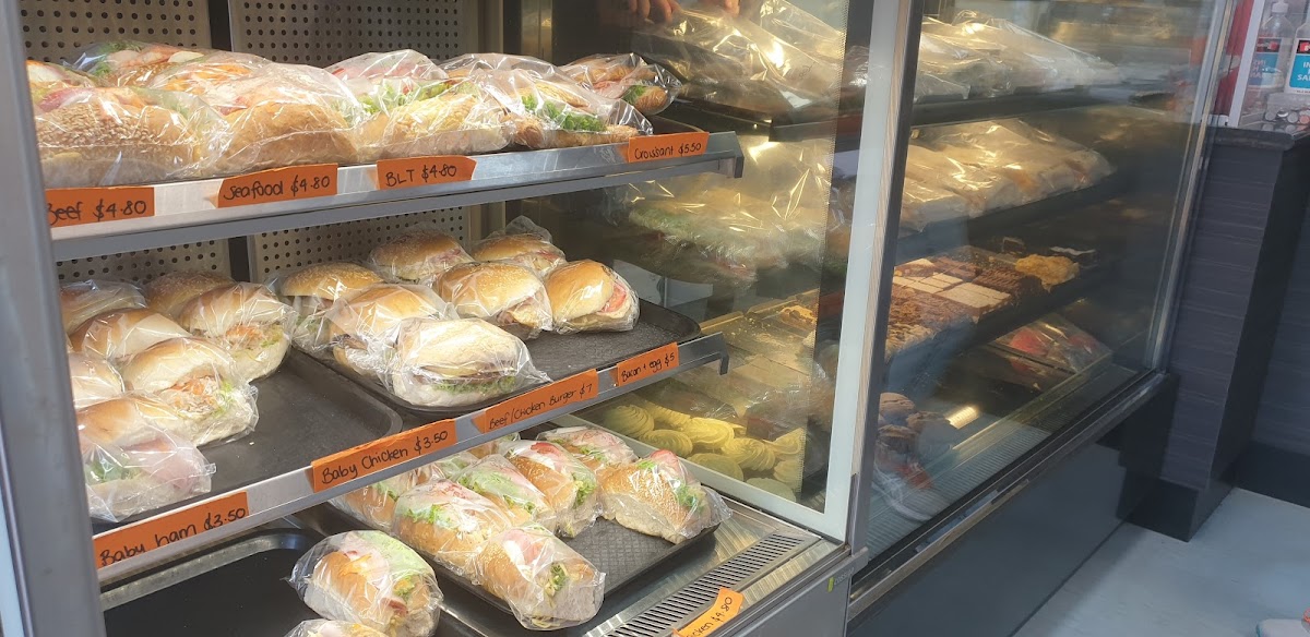 Fresh filled rolls with handwritten price labels